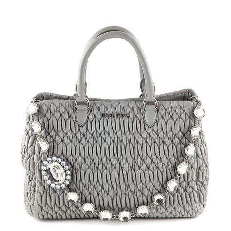 miu miu nappa crystal quilted leather tote|Bags .